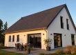 Pente de toiture à 30 degrés visible sur le versant d'une maison individuelle | Artihome